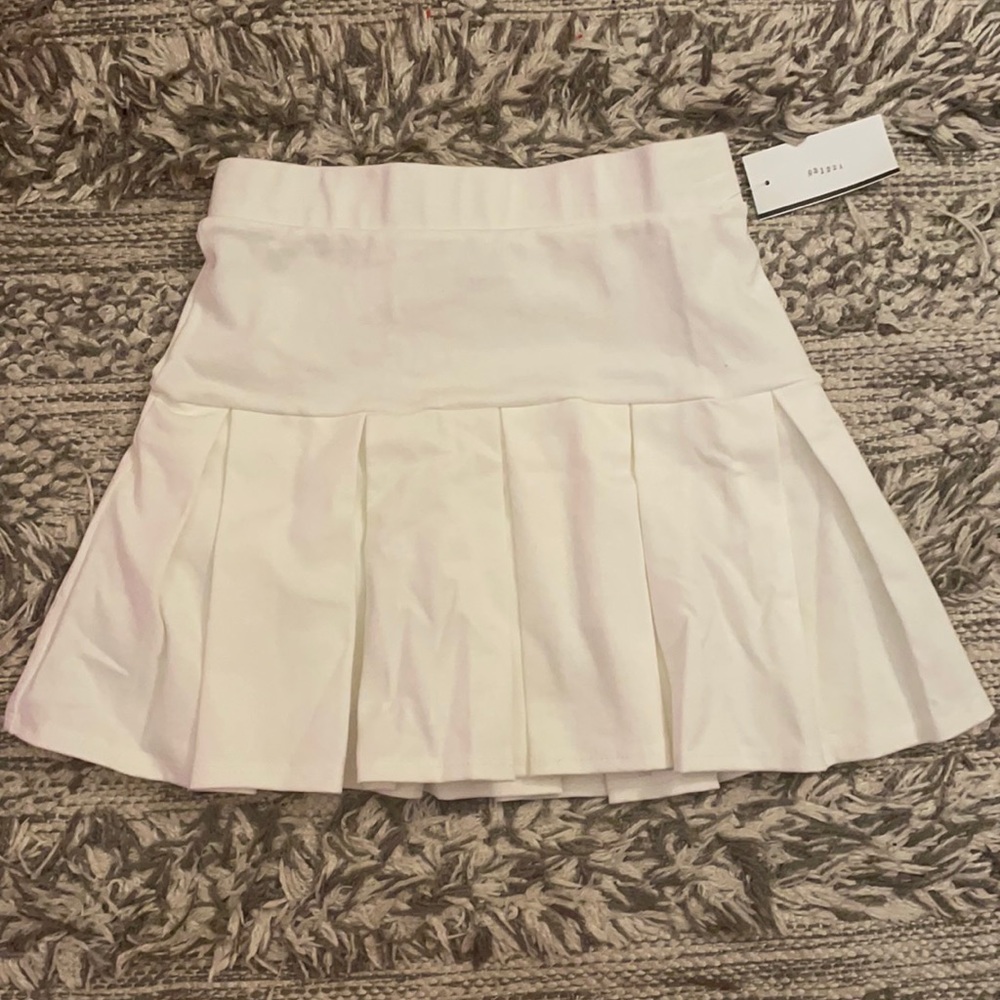 Brand new never worn white tennis skirt.